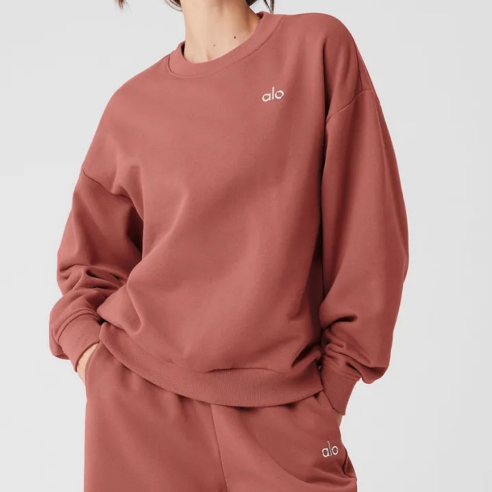 ALO Yoga Women's Accolade Crewneck Sweatsuit Set. Color is Soft Terracotta.
